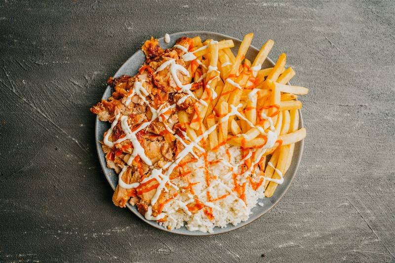 Halal snack pack with chips and sauces